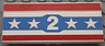 Vehicle, Spoiler / Plow Blade 6 x 3 with Hinge with Red and Blue Stripes with White Number 2 and Stars Pattern