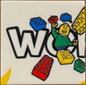 Tile 2 x 2 with LEGO World Logo Left Half, 'WO', Minifigure with Blue Cap, Bricks and Yellow Point in Corner Pattern