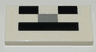 Tile 2 x 4 with Black and Light Bluish Gray Rectangles (Minecraft Skeleton Face) Pattern