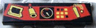 Tile 1 x 4 with Red Control Panel with Gauge and Yellow Buttons Pattern