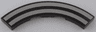 Tile, Round Corner 4 x 4 Macaroni with Silver Curved Stripes Pattern