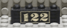 Brick 1 x 4 with Gold '122' Pattern