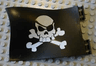 Duplo Flag Wavy 4 x 6 with Skull and Crossbones Pattern