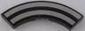 Tile, Round Corner 3 x 3 Macaroni with Silver Curved Stripes Pattern