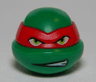 Minifigure, Head, Modified Ninja Turtle with Red Mask and Teeth Showing on One Side Pattern (Raphael)