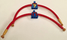 Torso, Modified Female Red Scarf and Yellow Lightning Bolt Pattern / Red Long Rubber Arms with 1 Pearl Gold Cuff Pattern / Medium Nougat Hands