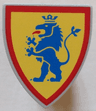 Minifigure, Shield Triangular Short with Blue Lion Standing on Yellow Background with Red Border Pattern
