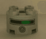 Brick, Round 2 x 2 with Axle Hole with Black and Green Line and Round Speaker Pattern (Sticker) - Set 4981