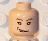 Minifigure, Head Male Brown Eyebrows, White Pupils, Sneer, Right Dimple Pattern