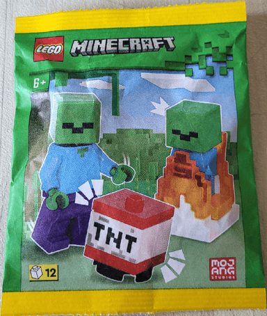 Zombie with Burning Baby Zombie and TNT paper bag