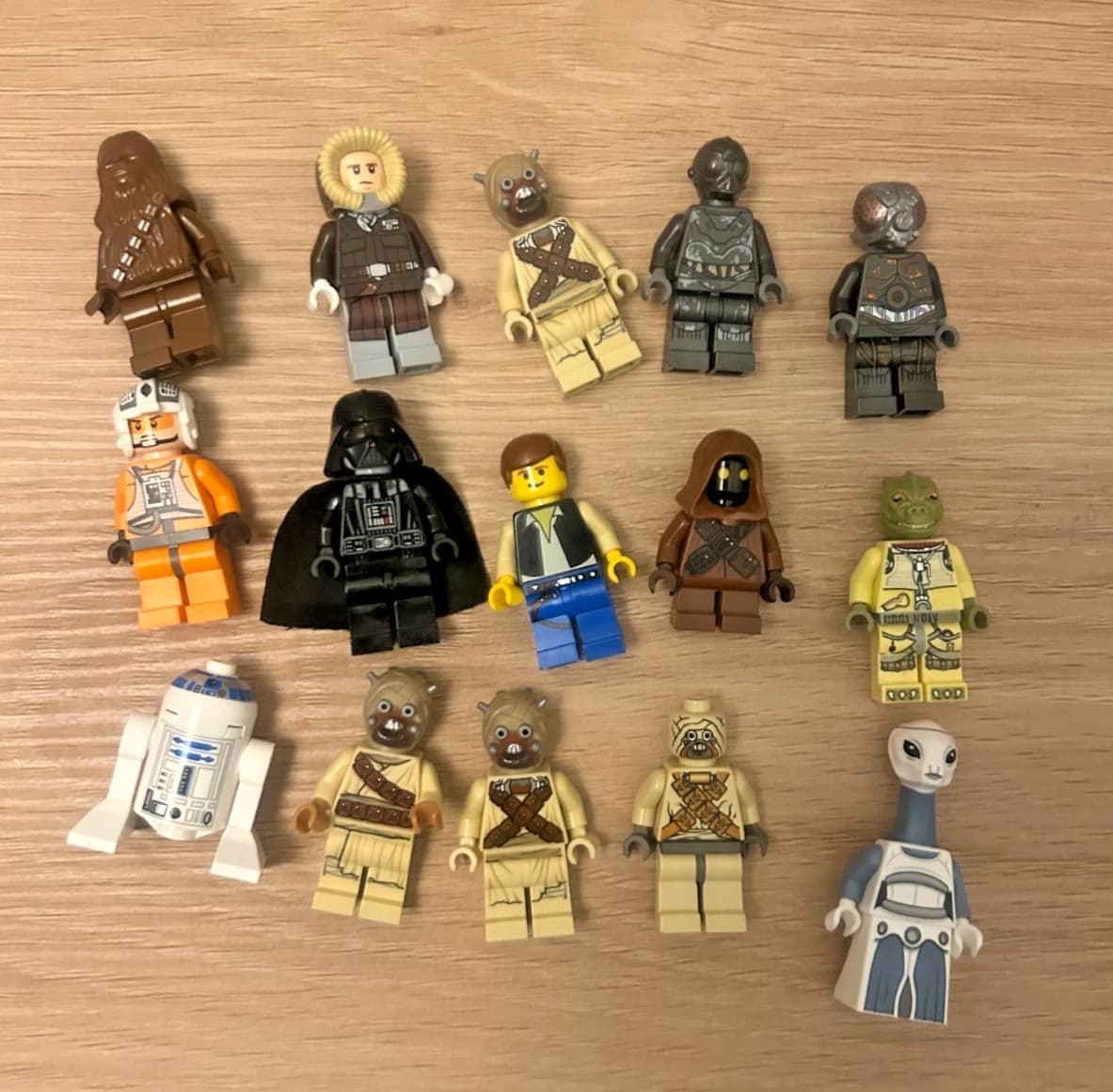 eBay listing of 15 LEGO Star Wars minifigures being scanned by the brick'em Chrome extension
